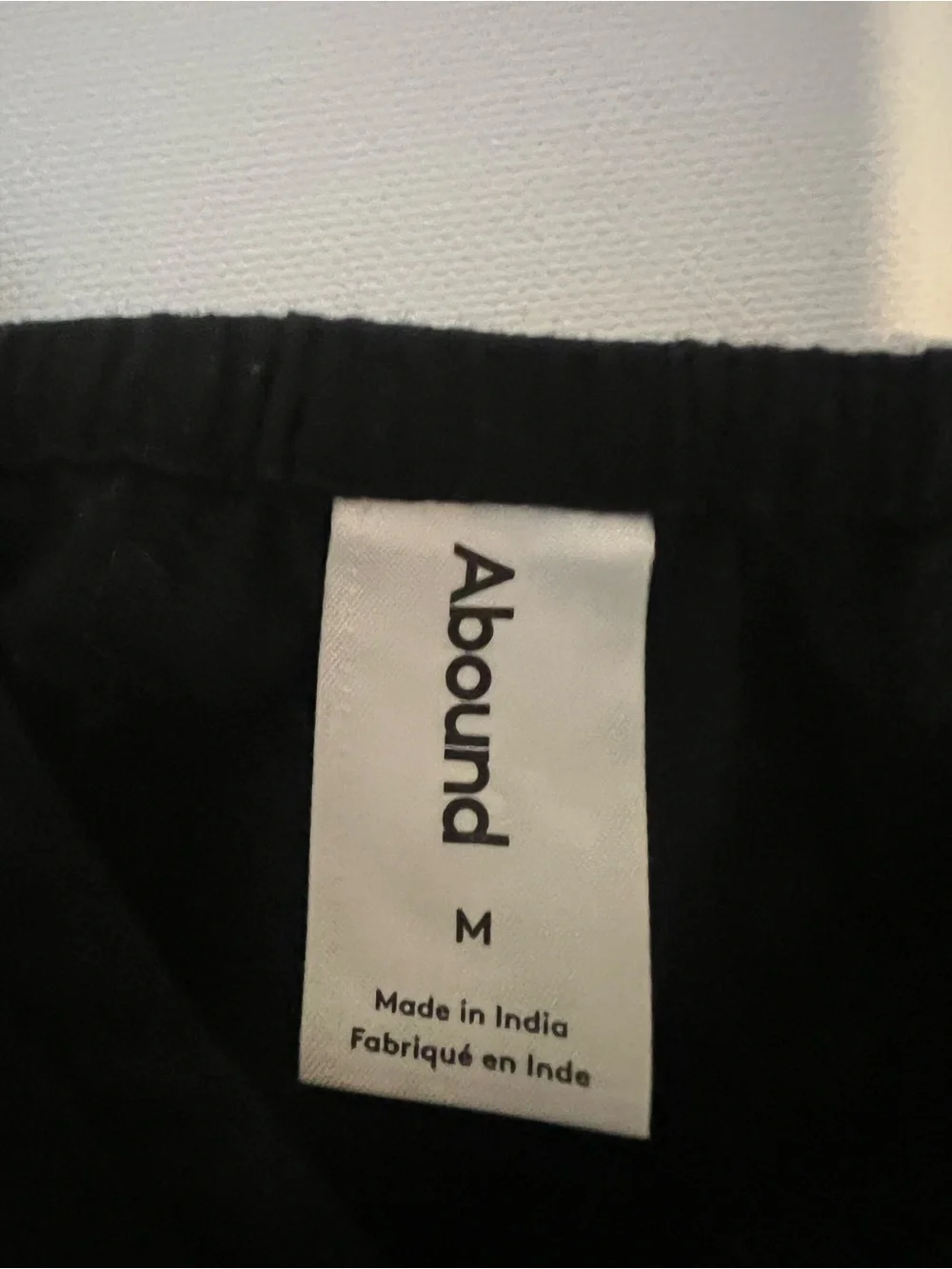 Abound Black Spaghetti Strap Peplum Camisole